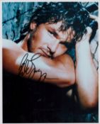 Patrick Swayze signed 10x8 inch colour photo. Good condition. All autographs are genuine hand signed