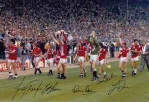Autographed MAN UNITED 12 x 8 photo : Col, depicting Man United players parading the FA Cup around