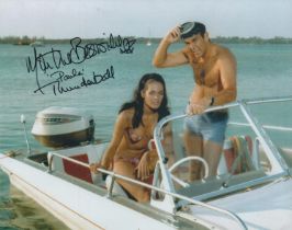 Martine Beswick signed 10x8 inch colour photo pictured in the Bond film Thunderball. Good condition.