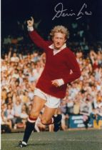 Autographed DENIS LAW 12 x 8 photo : Col, depicting a wonderful image showing Manchester United