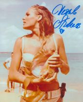 Ursula Andress signed 10x8 inch colour photo pictured in her iconic role in the James Bond movie