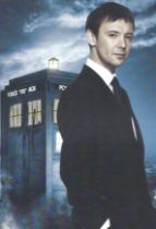 John Sims signed 12x8 inch Dr Who colour photo. Good condition. All autographs are genuine hand
