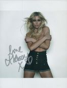 Abi Clancy signed 10x8 inch colour photo. Good condition. All autographs are genuine hand signed and