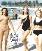 Martine Beswick signed 10x8 inch colour photo pictured in the Bond film Thunderball. Good condition.