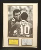Pele signed 23x19 mounted signature piece includes signed photo, unsigned photo picturing the iconic