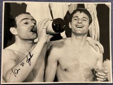 Ian St John signed 16x12 inch black and white photo pictured with his Liverpool teammate Roger Hunt.