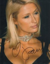 Paris Hilton signed 10x8 inch photo. Good condition. All autographs come with a Certificate of