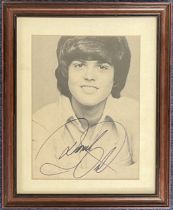 Music. Donny Osmond Signed black and white image, housed in a wooden frame measuring 11.5 x 9 inches