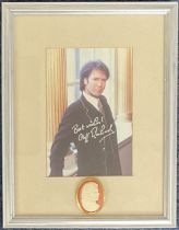 Music. Cliff Richard Signed colour photo housed in a silver effect frame measuring 11 x 9 inches