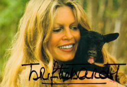 Brigitte Bardot signed colour postcard photograph of the French film star and animal activist.