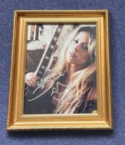 Shakira 10x12 overall mounted and framed signature display. Good condition. All autographs come with