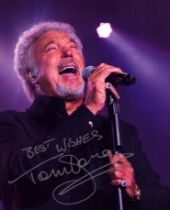 Tom Jones signed 7x5inch colour photo. Good condition. All autographs come with a Certificate of
