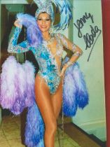 Jenny Llada signed 7x5 colour photo. Jenny Llada (born 22 February 1953) is a Spanish vedette,