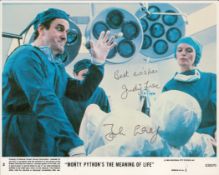 Monty Pythons The Meaning of Life, a 10x8 film photo. Signed by Monty Python star John Cleese and