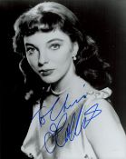 Joan Collins signed 10x8 inch black and white photo. Good condition. All autographs are genuine hand