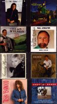 Music collection of 8 signed CDs including names of The Tractors, Paul Wheater, Clint Black and