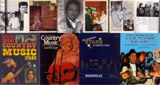 Country Music collection of 4 books signed by some artists who are featured including names of