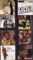 Music collection of 8 signed CDs including names of Ricky Van Shelton, Charley Pride, Nanci Griffith