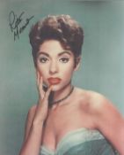 Rita Moreno signed 10x8 inch colour photo. Good condition. All autographs come with a Certificate of