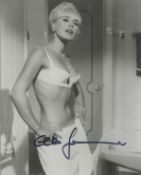 Elke Sommer signed 10x8 inch black and white photo. Good condition. All autographs come with a