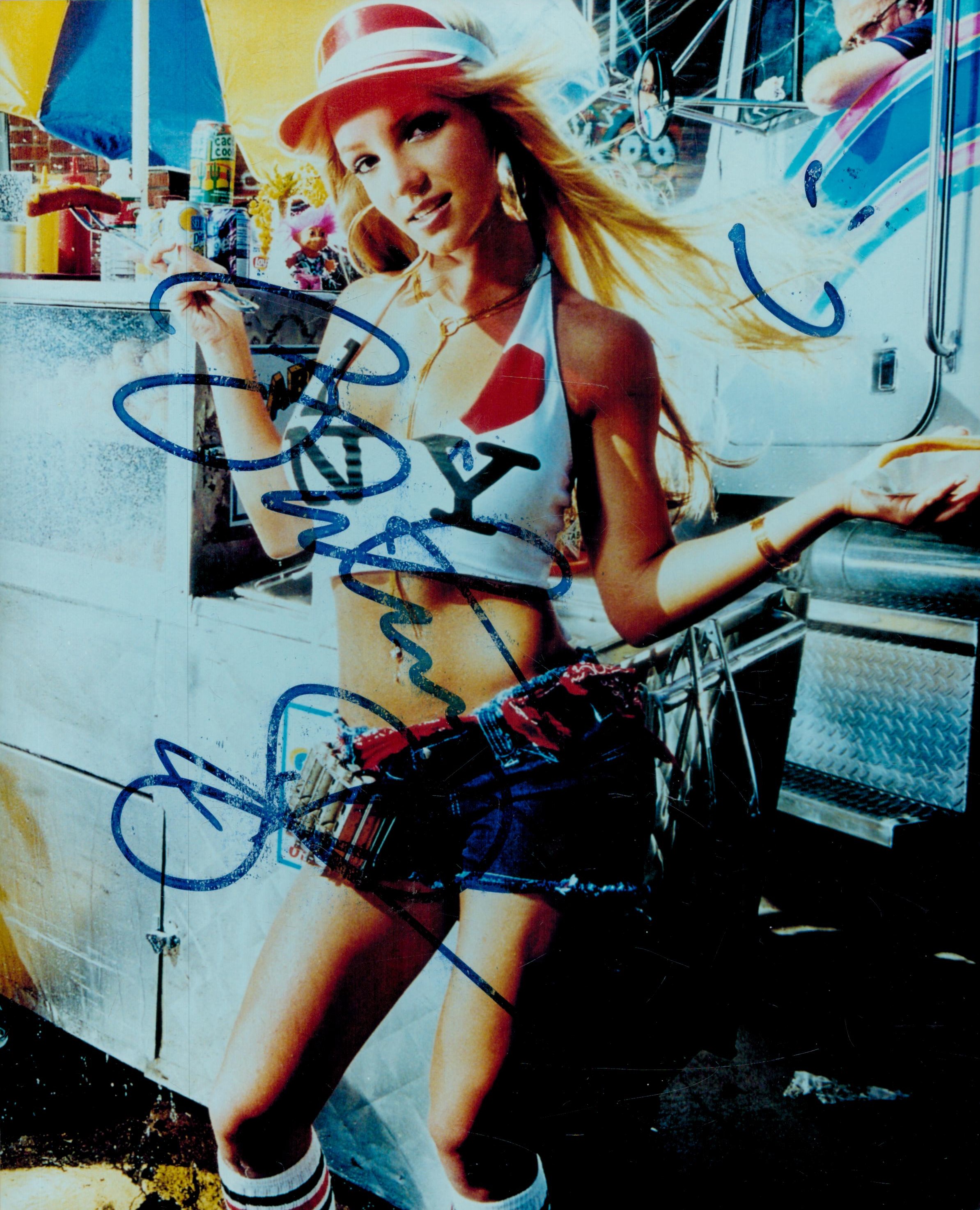 Britney Spears signed 10x8 inch colour photo signature slightly smudged. Good Condition. All