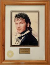 Patrick Swayze framed signed 10x8 inch approx photo with engraved name plaque. Frame size 17x13