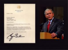 George W. Bush mounted signature piece including 5x6.5 inch colour photo and signed letter. Good