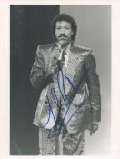 Lionel Richie signed 6x8 black and white photo. Good Condition. All signed items come with our
