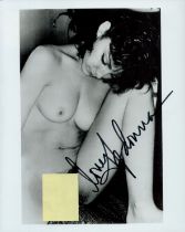 Madonna signed 10x8 inch risque black and white photo. Good Condition. All signed items come with