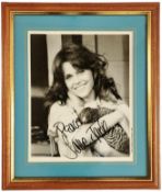 Jane Fonda framed signed colour photo in 13.5x11.5 inch approx frame. Good Condition. All signed