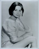 Nancy Kwan signed 10x8 inch black and white photo. Good Condition. All signed items come with our