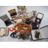 A quantity of costume and silver jewellery, including a string of amber beads and two hardstone