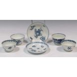 A Caughley blue and white tea bowl and saucer, three 18th century Worcester tea bowls and saucers