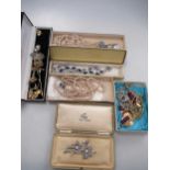 Two jewellery boxes with a quantity of costume jewellery, together with two silver pocket watches,