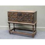 An 18th century oak plank chest on stand, with split baluster decoration, 82 x 93 x 37cm