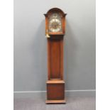 A George III style oak longcase clock with arched hood, the brass dial inscribed St Michael