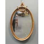 Giltwood oval mirror, 75 x 46cm
