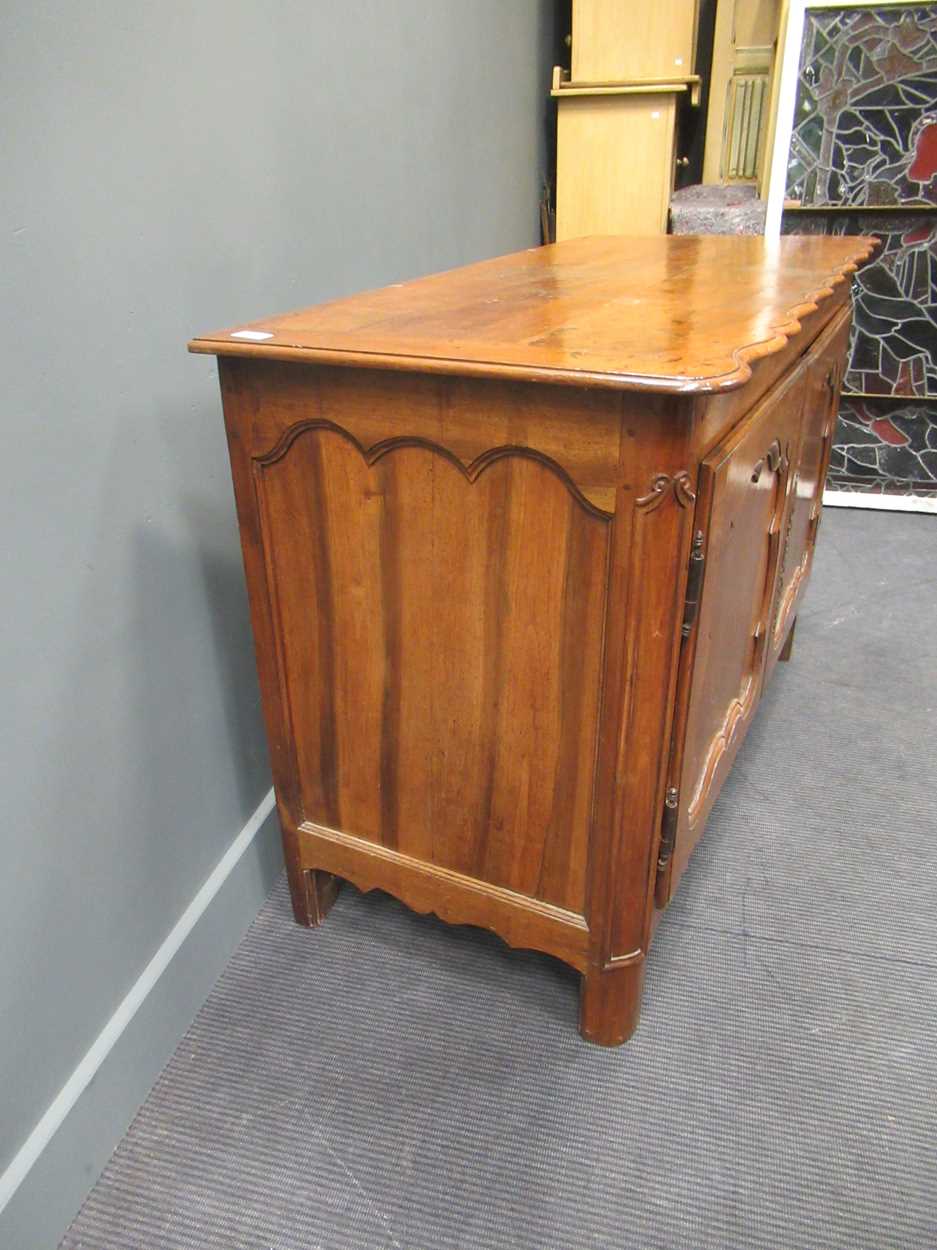A 19th century French walnut side cabinet, the shaped top above two cupboard doors, 95 x 138 x 63cm - Image 5 of 6