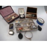 A large collection of silver and base metal jewellery, including a 19th century paste brooch and a