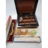 A large collection of costume jewellery, including four jewellery boxes