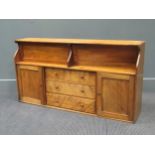 An early 20th century satinwood wall cabinet, comprising of four cupboards and three drawers, 60 x