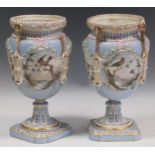 A pair of Continental porcelain pale blue ground vases, 19th Century (lacking covers), applied