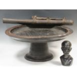 An African treen tazza, together with a quiver of arrows and a carved hardstone bust of a man