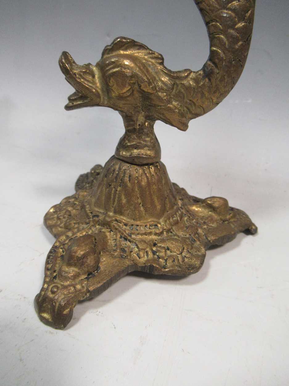 A pair of 19th century gilt metal wall sconces together with a brass candlestick with dolphin - Image 3 of 5