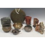 Three Chinese carved soapstone forms and a collection of mostly Indian copper and brasswares