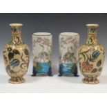 A pair of Longwy cloisonne style cylindrical vases depicting cranes under cherry blossom trees
