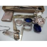 A collection of silverware including cigarette case, cruets, flatware, compact, carving set etc