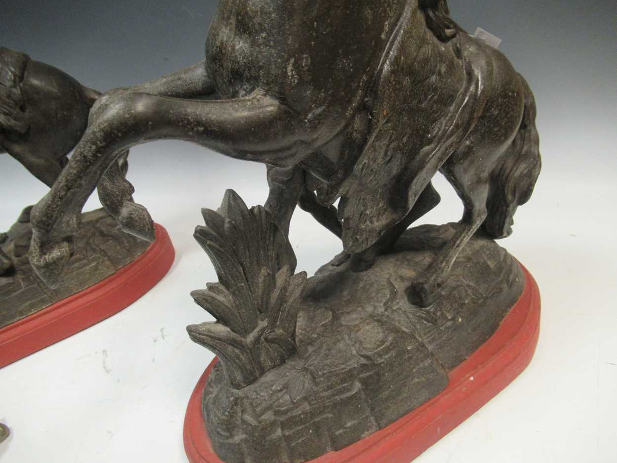 A pair Marley horses on red painted wooden plinths, 43 x 33 x 18cm; together with a brass figure - Image 3 of 5