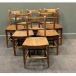 A set of six 19th century country fruitwood chairs with panel seats on square tapered legs