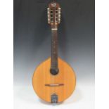 A Barnes & Mullins 'Abbot' model mandolin, round body, 8 strings, 65cm long